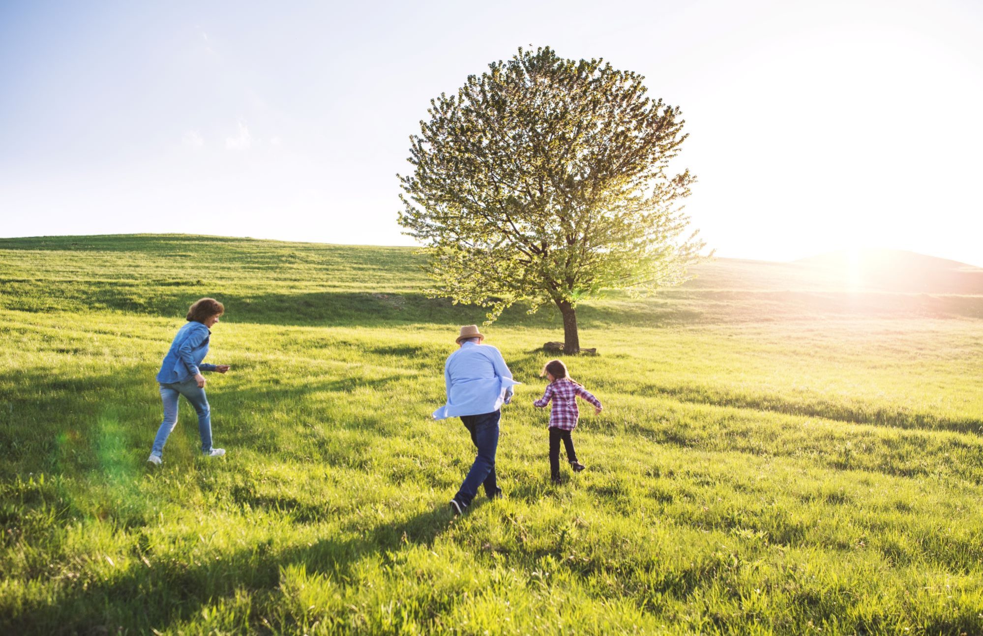 a-small-girl-with-her-senior-grandparents-playing-2023-11-27-05-10-31-utc